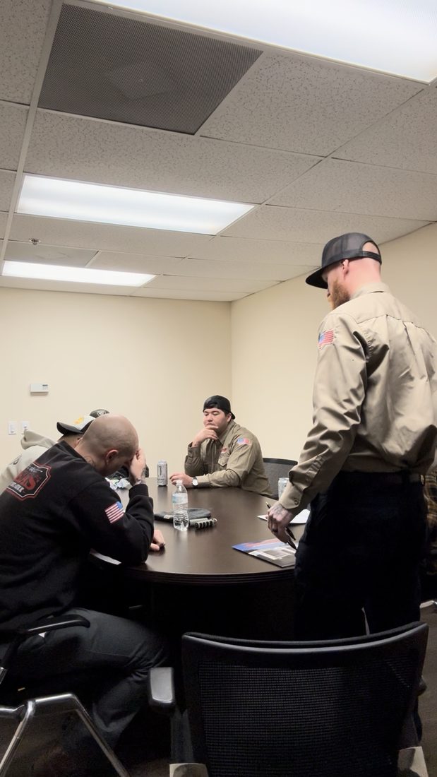Riley Rea leading an in-house technical and system design training session with the Rea's Air Conditioning and Heating crew
