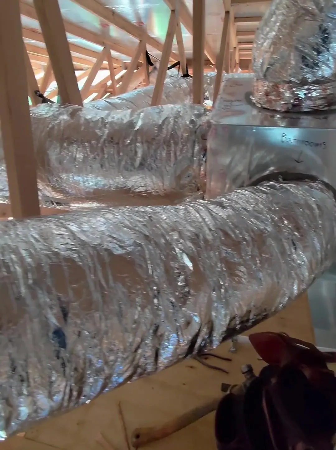 Labeled zone duct takeoffs in an attic
